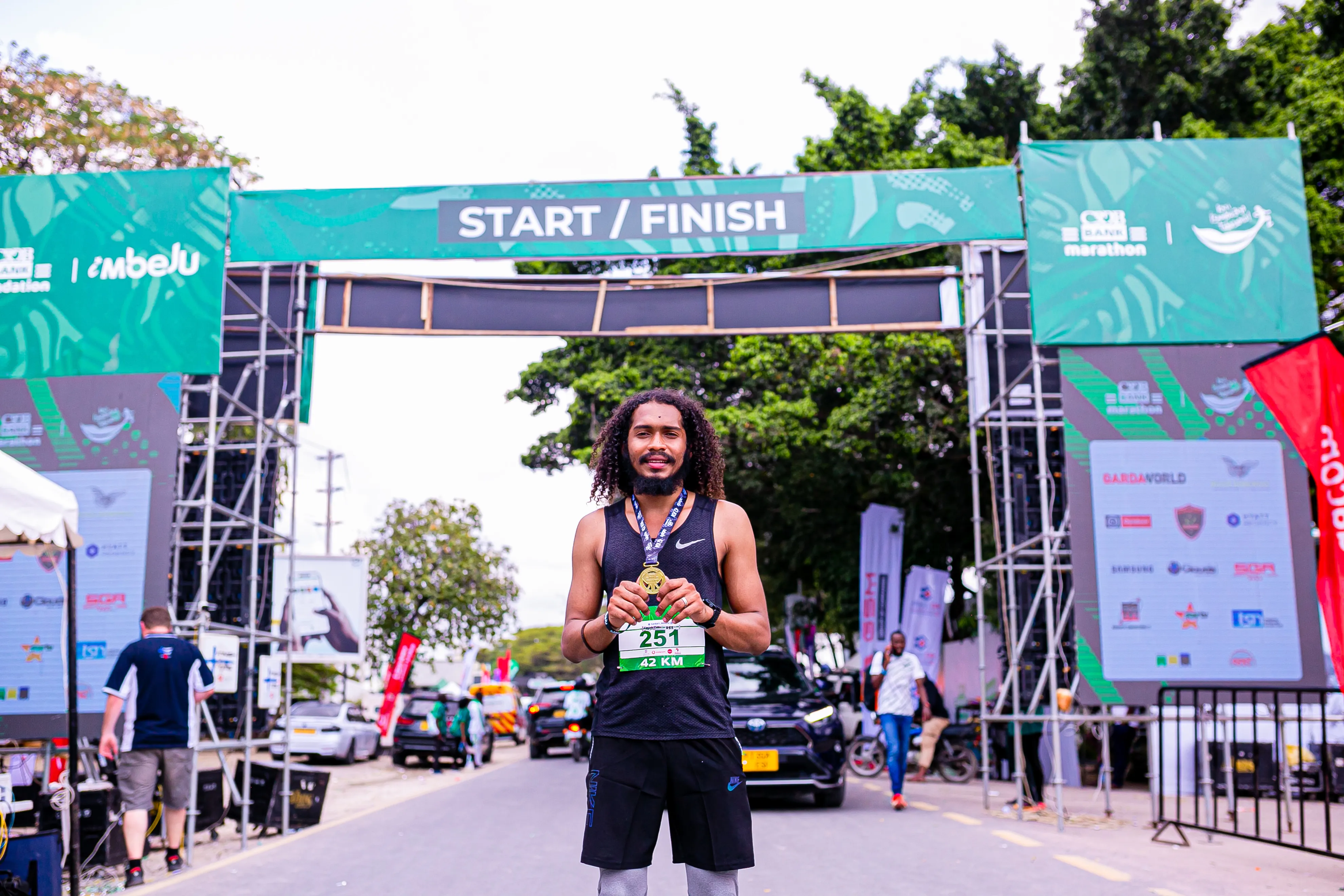 Rohit after finishing a marathon with his medal